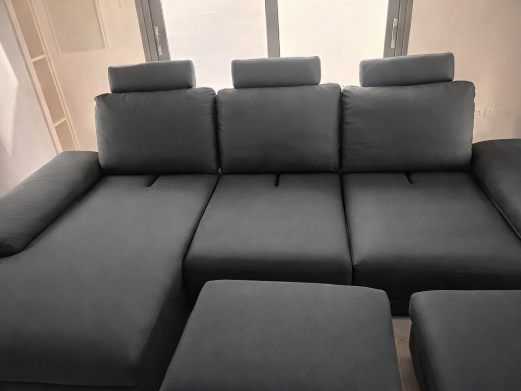 Black sofa after upholstery cleaning in Limassol